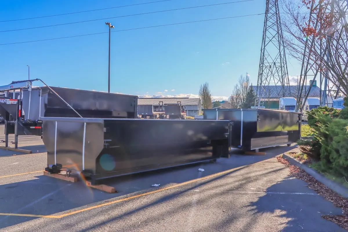 Roll-off dumpster ready for waste disposal at job site for Concrete Dumpster Rental in DeFuniak Springs